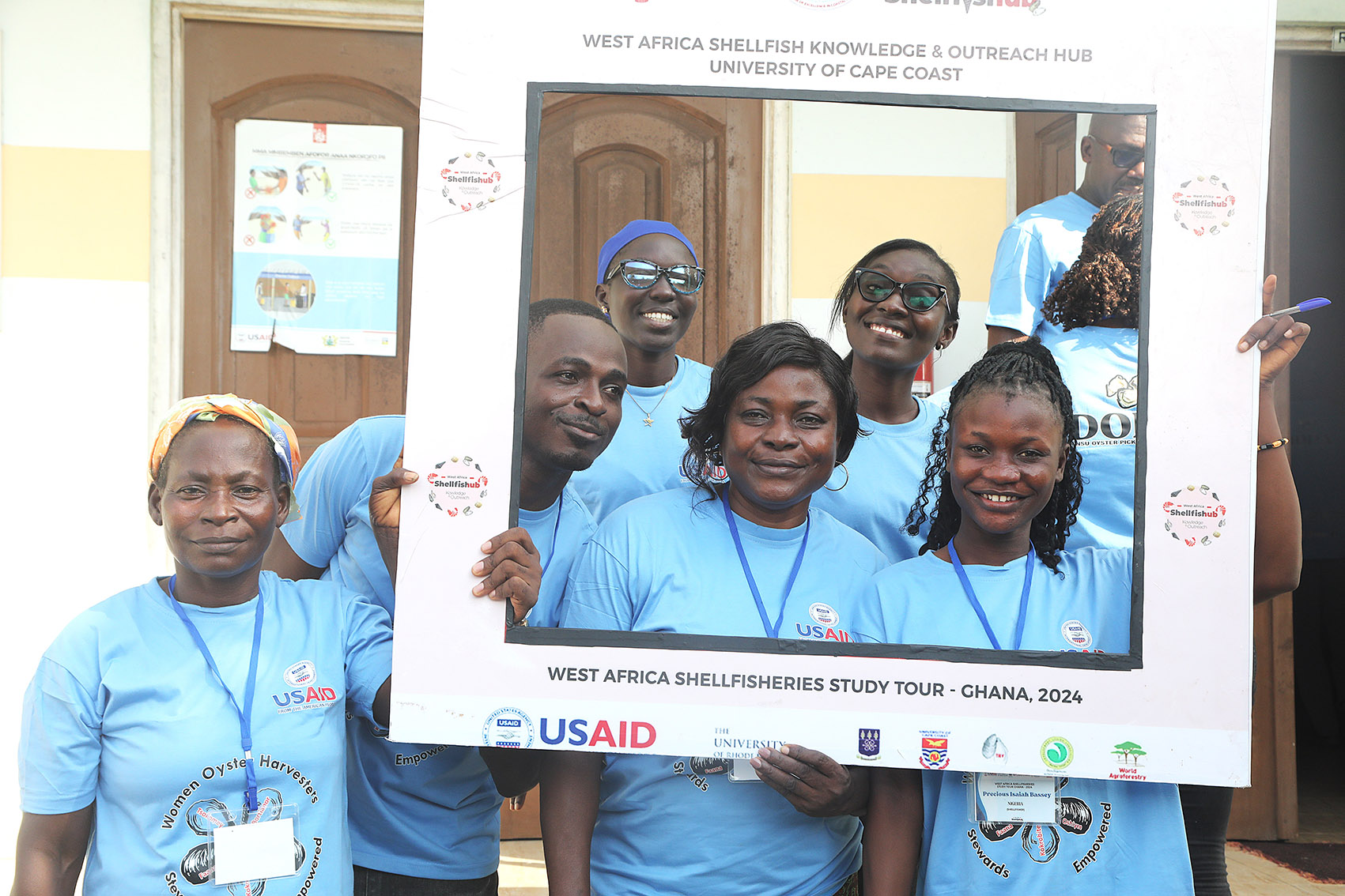 Precious (right) and some participants of the shellfish peer learning experience in Ghana